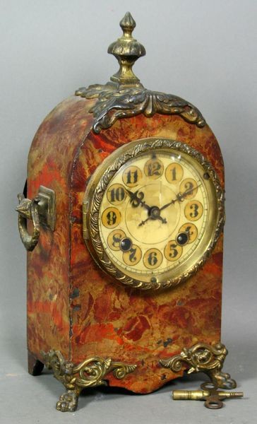19th C. English Tole Decorated Cast Iron Clock: 19th Century English tole decorated cast iron clock, dated on movement "1889", having pendulum and key, 11"h. x 7"w. x 4"d. Clock face is cracked.