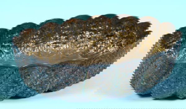 Sterling Repousse Bowl: Sterling repousse Bowl, marked on bottom "Theodore B. Starr New York", marked 925, 2 1/2"h. x 9 3/4"w. x 7"d., 16.81 troy oz. Good condition.