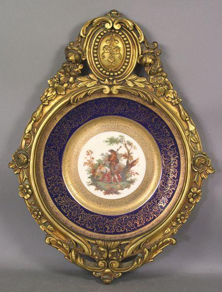 Early 20th C. Bavarian Decorated Plate: Early 20th Century Bavarian decorated plate, marked on back "Hutschenreuther", 10 1/2"dia. (plate), 18" x 13 1/2" in gilt frame. Good condition.