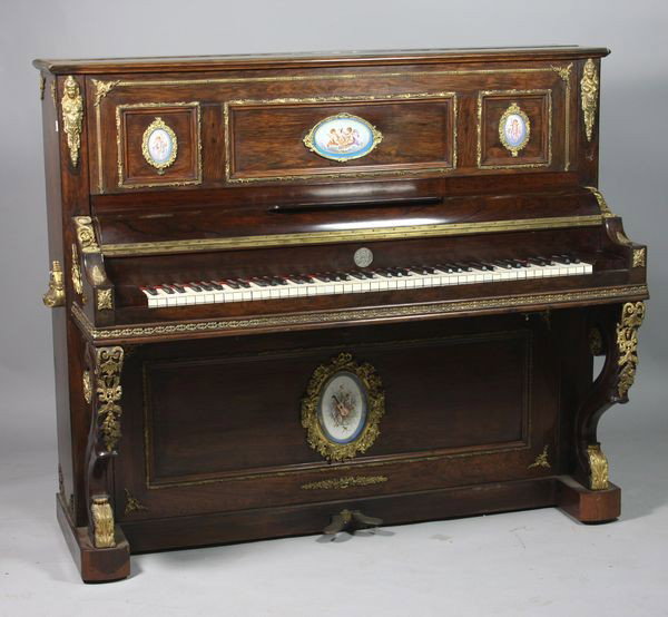 Exceptional French Piano: Exceptional 19th Century French Louis XVI-style rosewood piano with fine bronze ormolu mounts and beautifully hand painted Sevres porcelain oval medallion panels of cupids and portraits of Louis XVI a