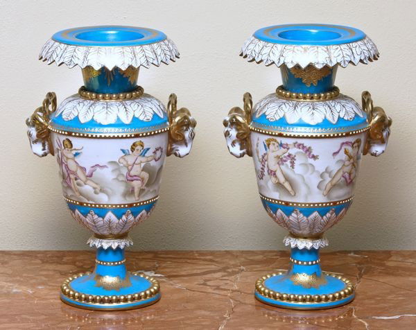 Pr. of Late 19th C. Meissen Hand Painted Paris Po: Pair of late 19th Century Meissen hand painted vases with putti and rams head handles, having a Meissen cross sword mark on bottom, 14"dia. Good condition.