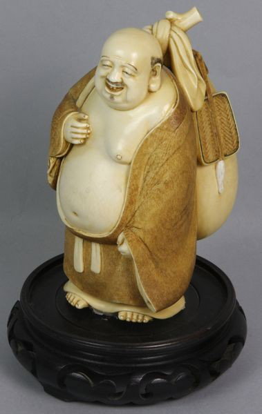 Japanese Carved Ivory Figure: Japanese carved ivory figure of a fat man, signed on base, 7 1/4"h x 4 3/4"w. Good condition.