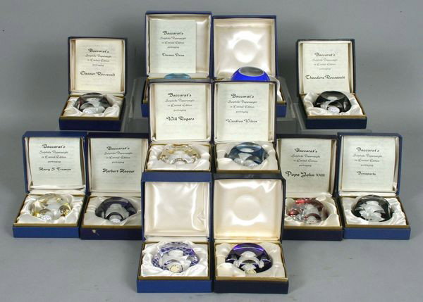 Collection of Baccarat Sulphide Paperweights: Collection of twelve (12) Baccarat sulphide paperweights to include John F. Kennedy, Theodore Roosevelt, Harry Truman, Herbert Hoover, George Washington, double overlay Truman, Thomas Paine, Eleanore 
