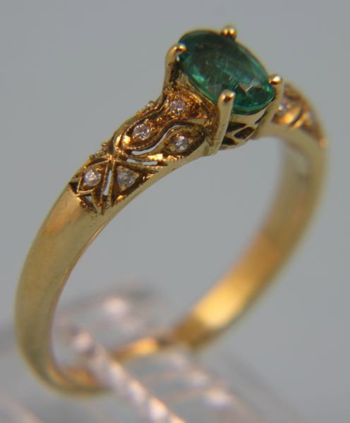 18K Yellow Gold, Emerald, and Diamond Ring: 18k yellow gold ring, 3.5 cts emerald, 0.10 ct t.w. of diamonds, size 6, 0.10 oz/2 dwt t.w. Good condition.