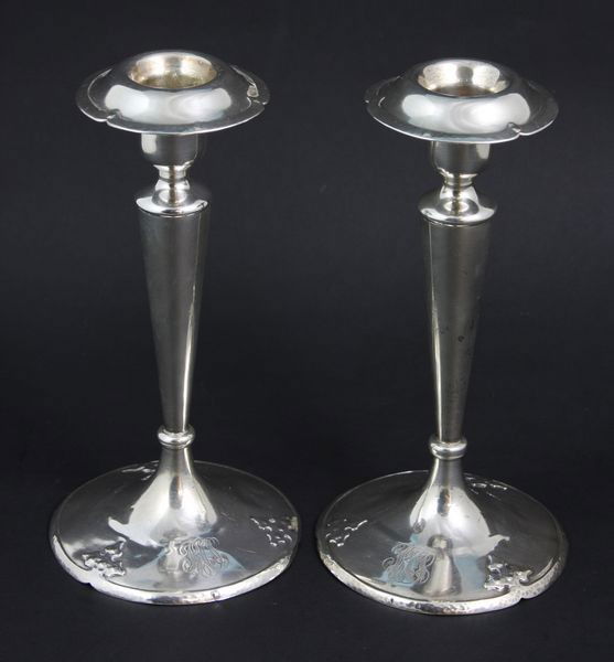 Sterling Silver Arts & Crafts Style Candlesticks: Pair of sterling silver Arts & Crafts style candlesticks, marked "Shreeve & Co. Sterling San Francisco," monogrammed, 7 1/2"h x 3 3/4"w, 16.8 troy oz t.w. Dents to base.