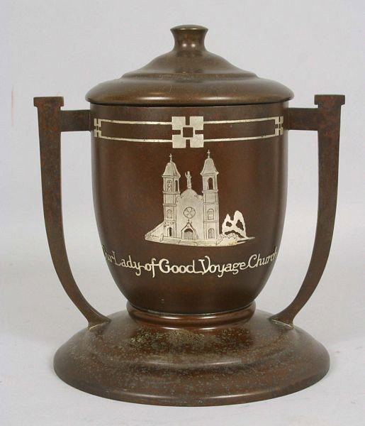 Historically Significant Custom Heintz Art Humidor: Custom Heintz Art humidor gifted to “Cong. A. Piatt Andrew from Our Lady of Good Voyage Church, Gloucester, MA 1925,” stamped Heintz Art mark on bottom, sterling on bronze, 9"h x 7 3/4"d. Finish w