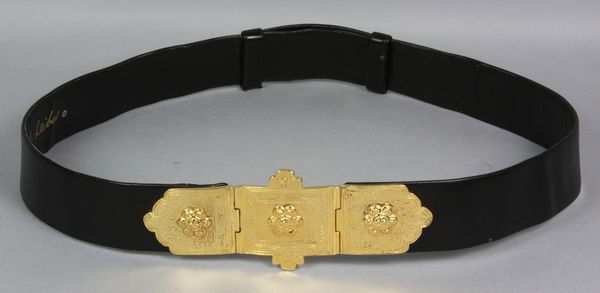 Judith Liber Moorish Black Leather Belt: Judith Leiber Moorish black leather adjustable belt, signed "Judith Leiber" on buckle, 31"l x 2 1/4"w. Good condition.