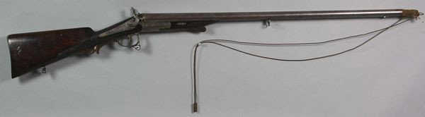 Antique 12 Gauge Double Barrel Shotgun: Antique 12 gauge, Damascus steel double barrel shotgun, gold inlay, initialed "J.B.," steel etchings of wildlife, finely carved walnut stock, #2303, made by K. Werlik in Teschen, 44 1/4"l (overall), b