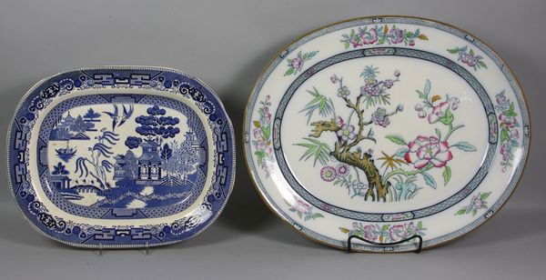 Two (2) 19th C. English/American Platters: Two (2) 19th Century English/American platters, one (1) Ashworth Brothers, 20"w, one (1) Buffalo Pottery, 15 3/4"w. Minor chips on edges.