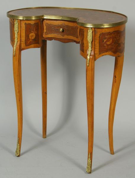 Early 20th C. Kidney Shape End Table: Early 20th Century kidney shape one drawer end table with floral inlay and brass mounts on legs, 28 1/2"h x 24"w x 14 1/2"d. Having some age minor age wear.