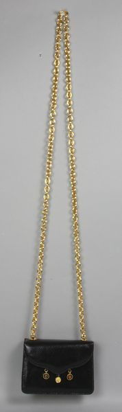 Judith Leiber Black Handbag: Judith Leiber black handbag with a gold chain and three (3) medallions on front includes a comb and a mirror, 4"h. x 5 1/2"w. x 2"d. Good condition.