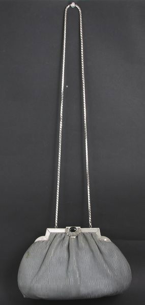 Judith Leiber Gray Handbag: Judith Leiber gray handbag with a silver strap and mirror, 6 1/2"h x 10"w x 5"d. Minor staining left corner.