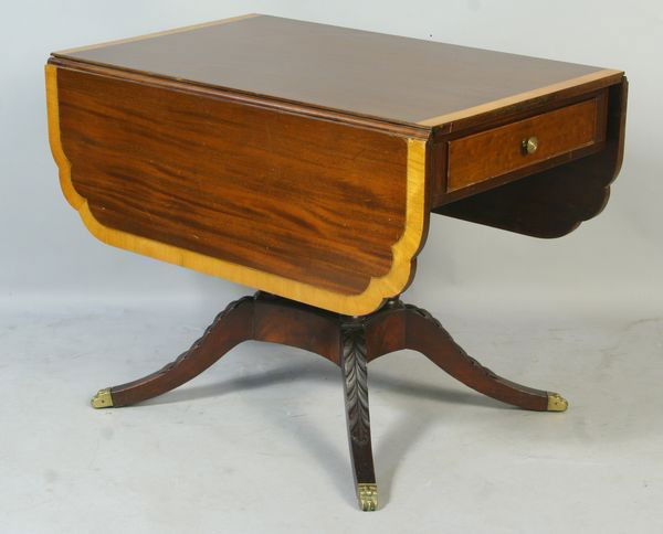 Early 20th C. Fine Duncan Phyfe Drop Leaf Table: Early 20th Century fine Duncan Phyfe style mahogany drop leaf table with satin wood inlay and single drawer, 29 1/2"h x 52"w x 39"w. Good condition.