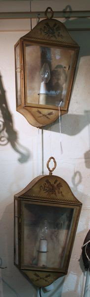 Pair of Tole Painted Tin Wall Sconces: Pair of tole painted tin wall sconces, 20"h (overall) x 10"w. One (1) panel cracked, finish wear; working condition unknown.
