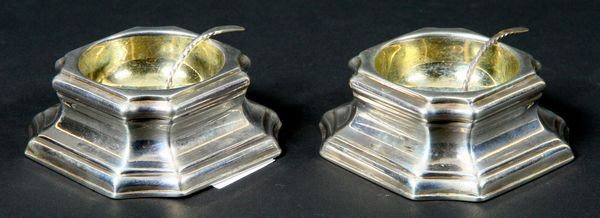 Pair of London Trencher Salts: Pair of London silver trencher salts with spoons, George II, 1732 by Jas Smith, with tag, 5.4 troy oz, 2 3/4"square. Good condition. Provenance: The items offered are from the Estate of RICHARD ALFRED