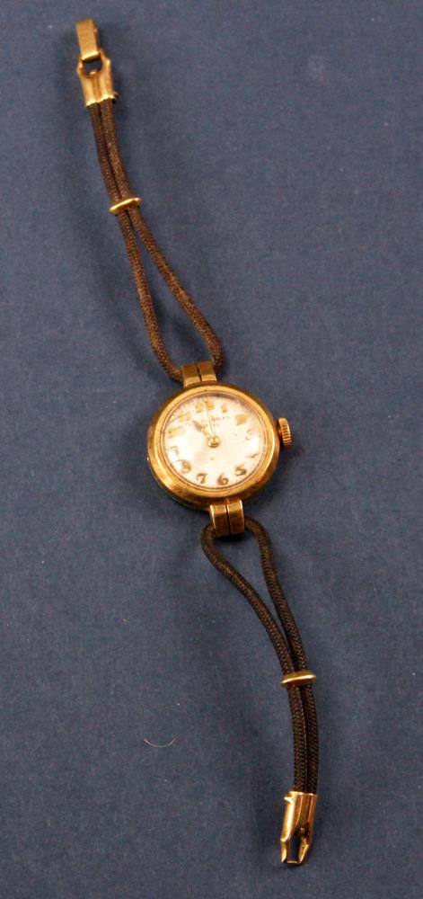 Patek Philippe Ladies Wristwatch: Patek Philippe (Geneve) ladies wristwatch, 18k gold mounts initialed KAR Serial #260030. Provenance: Manchester, Massachusetts collection. PLEASE NOTE: payment for silver, gold, jewelry, and coins mus
