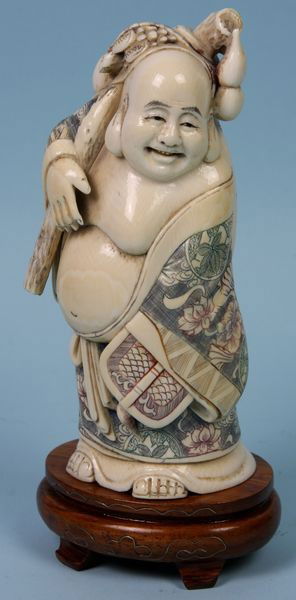 Ivory Standing Buddha: Ivory Standing Buddha, Japan, early 20th century, hand carved and colored, marked on bottom, atop a low wooden base, 5" high.