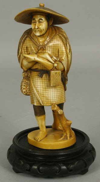 Ivory Figure: Ivory Figure, Japan, 19th century, hand-carved, of a farmer figure in a standing position, marked on base, 6" high x 2 1/2" wide.