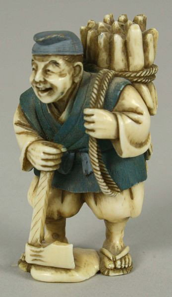 Ivory Figure: Ivory Figure, Japan, 19th century, hand carved ivory figure of a farmer figure at work, marked on base.