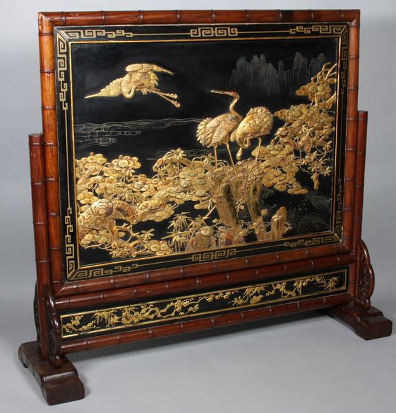 Wood Display Stand: Wood Display Stand, China, early 20th century, carved and gilt with crane and pine tree in relief, 54 1/2" high x 57" wide.