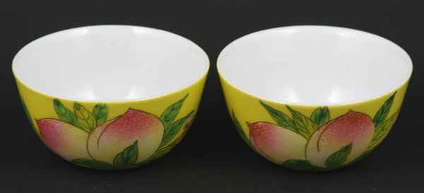 Pair of Famille Rose Tea Cups: Pair of Famille Rose Tea Cups, China, 19th century, 1 1/2" high x 3" diameter.