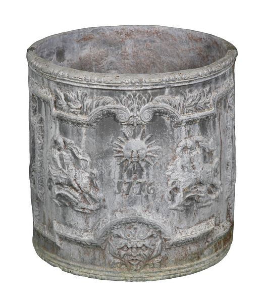 English Lead St. George Jardinière: English lead round jardinière with two hand-embossed panels depicting St. George in ornate foliate and scroll frames, dated "1776," 17 1/2" high x 18" diameter, approximately 175 lbs total. Undamaged