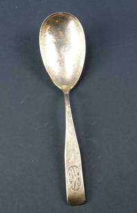 Arts and Crafts Hand-Hammered Sterling Spoon: Arts and Crafts hand-hammered sterling serving spoon with unidentified maker's mark, 9 1/4" L, initialed "EKR". Approximately 30 troy oz. Provenance: Furnishings from the Park Avenue home of a New