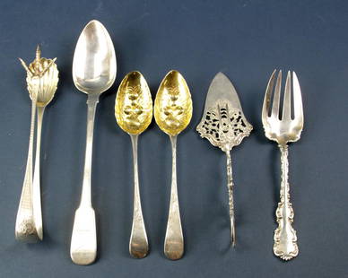 Group of Sterling Service Pieces, with Tongs: Group of sterling service pieces, to include: pair of English silver serving spoons with gilt bowls; English silver stuffing spoon hallmarked London, WS, 1825-1826; sterling serving fork hallmarked