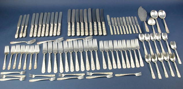 S. Kirk and Son Sterling Repousse Flatware Set: S. Kirk and Son sterling repousse pattern flatware set, no monogram, including: (11) 7 3/4" forks, (9) 7 1/4" forks, (10) 6" forks, (11) 5 7/8" ice cream spoon/forks, (10) 5 1/4" seafood forks, (4) 7