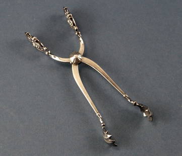 Georg Jensen Sterling Acorn Pattern Ice Tongs: Georg Jensen sterling ice tongs, "Acorn" pattern. Approximately 2.2 troy oz. Provenance: Furnishings from the Park Avenue home of a New York socialite. PLEASE NOTE: payment for silver, gold,
