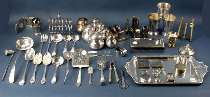 Silverplate Items, Asprey Tray, Candle Holders, etc: Group of silverplate items, to include: tray marked "Asprey England", candle holders, toast rack, flatware, office paper, etc., largest 17" x 9 1/4. Provenance: Furnishings from the Park Avenue home