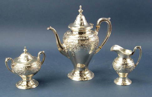 Sterling 3-piece Tea Set: Sterling 3-piece tea set comprising teapot, covered sugar, and creamer. Marked sterling. Monogrammed. Tallest piece 11". Approximately 55.8 troy oz TW. Good condition. Provenance: Furnishings from
