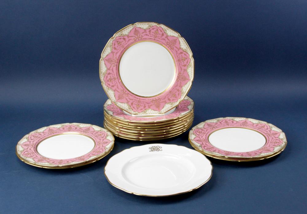 Royal Doulton Fancy Dinner Plates: Royal Doulton fancy dinner plates having pink border and ivory-colored background with raised gold, 10 1/2" diameter. (14) total. Provenance: Furnishings from the Park Avenue home of a New York social