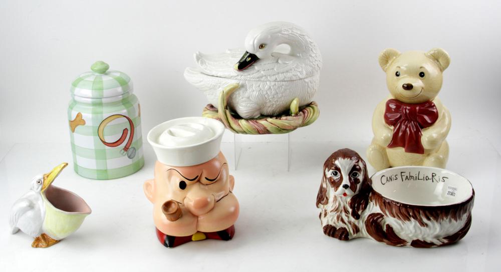 Group of Cookie Jars, Bowl: Group of cookie jars, covered swan, Popeye, teddy bear, spaniel bowl, (6) items total. Provenance: Furnishings from the Park Avenue home of a New York socialite.