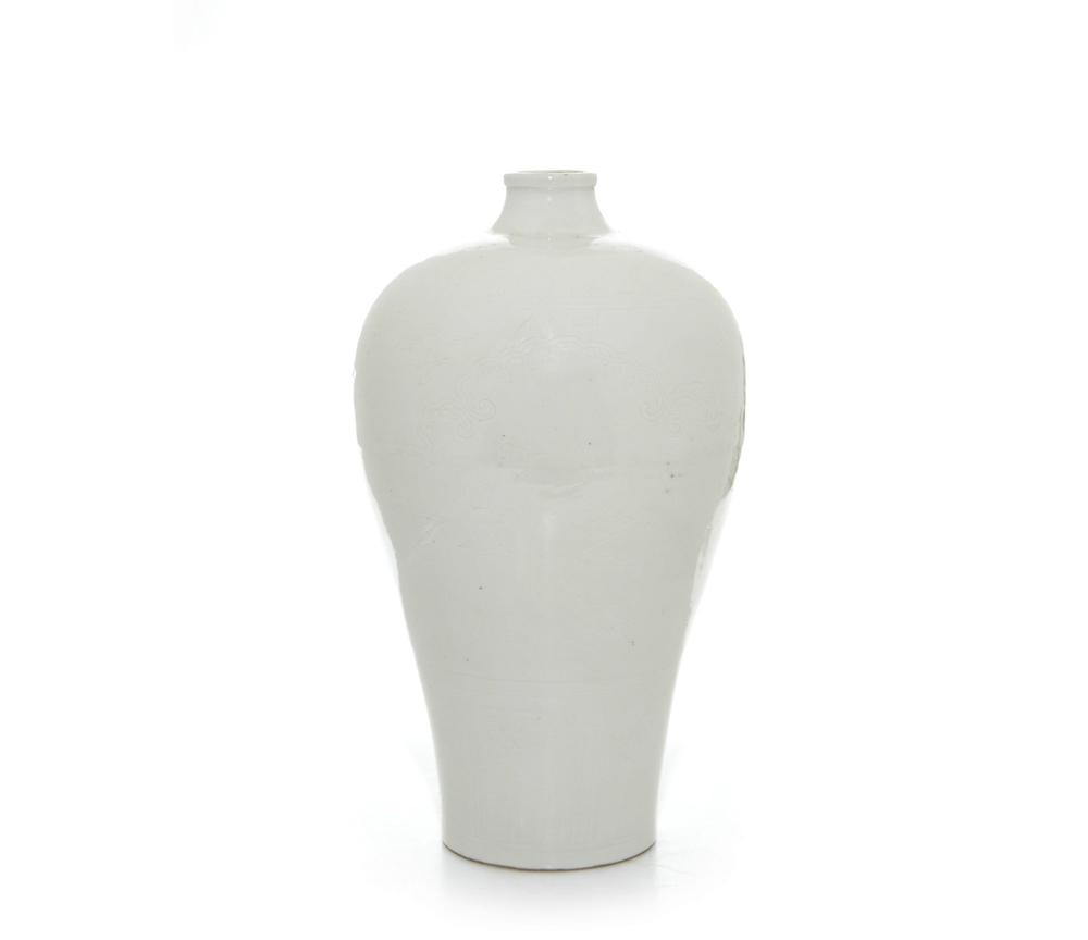 Rare Chinese Blanc-de-Chine Vase: Finely potted with a broad shoulder and waisted neck, vase incised with elegant depiction of scholars and students in a garden scene, all below billowing clouds, 18" H.