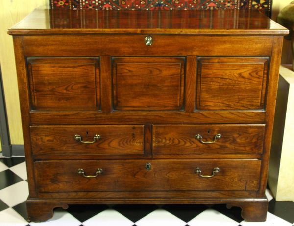 18th C. English Elm Mule Chest: 18th century English elm lift-top mule chest with three drawers, peg construction, 42" high x 51" wide x 23" deep, undamaged.