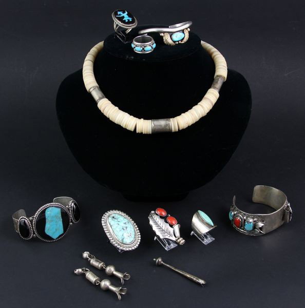 Navajo Silver and Turquoise Jewelry Set: American Indian, Navajo, silver and turquoise twelve-piece jewelry set to include: five (5) rings, two (2) bracelets (one is 14kt gold), trade bead necklace, watch band, pair of earrings, bangle.