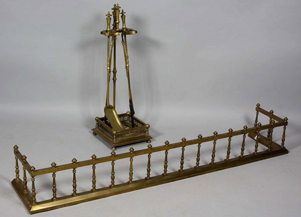 19th C. Brass Fire Fender: 19th century brass fire fender and tools, fender measures 8 1/2"h x 61"w x 11"d, tools measure 31 1/2"h x 11"w x 11"d.