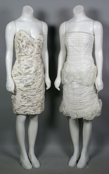 Two Saks Cocktail Dresses: Lot of two (2) Saks Fifth Avenue cocktail dresses, one white tulle with all over sequins, the other white silk with silver accents and sweetheart necklince, both approximate size 8/10. Minor fading.