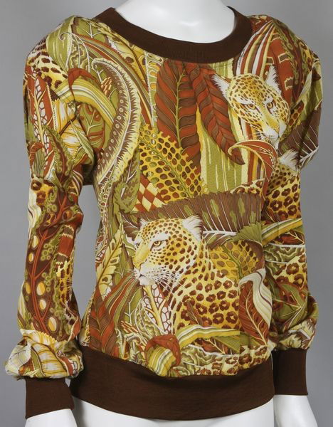 Ferragamo Silk Shirt: Salvatore Ferragamo silk long sleeved shirt with jungle pattern, approximate size medium. Good condition.