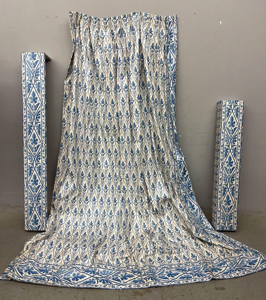 Chintz Blue and White Drapes, Valances, Bed Skirt: Chintz blue and white drapes and valances, two pair of drapes, 104" x 84", two valances, one 48" L and one 62" L, and queen-size bed skirt. Some staining.