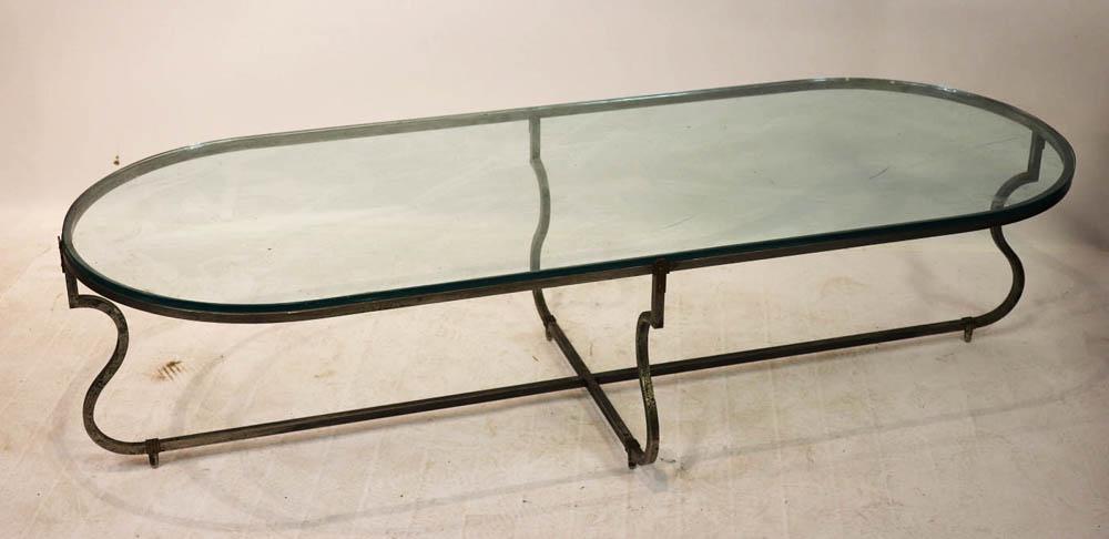 Vintage Tommi Parzinger Iron and Brass Table: Vintage Tommi Parzinger iron and brass table with glass top, 16" x 66" x 26".