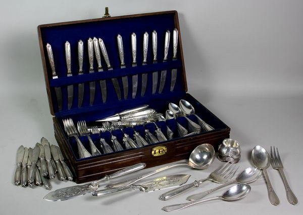 Austrian Silver Flatware Set: Circa 1920s 154-piece Austrian 800 silver flatware service in box, to include: twelve (12) large dinner knives (10"l with stainless blades), twelve (12) small dinner knives (8 1/2"l with stainless bla