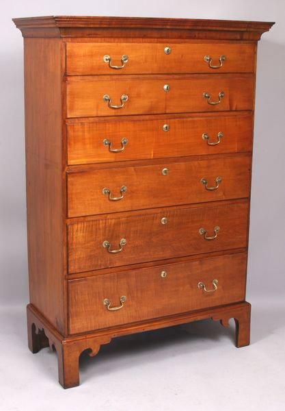 C1780 New England Maple Chest on Frame: Circa 1780 New England maple chest on bracket base six graduated drawers with bayle handles, molded lip, molded cornice flat top. 59""h. x 36 1/2"w. x 17"d.