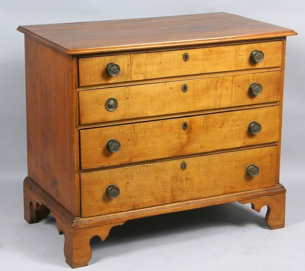 Late 18th C. American Chippendale Chest: Late 18th century American Chippendale maple chest having graduated drawers on bracket feet, original surface and pulls, 33"h x 39"w x 22"d. One brass rosette pull damaged, pickling to drawer fronts.
