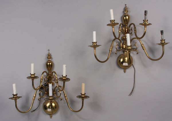 Pair of Brass Sconces: Pair of brass five (5) arm wall sconces with candelabra form, 20"h x 24"w x 13"d. Missing two (2) sleeves. Provenance: From the 20th Century Props lighting collection in Hollywood, C.A.