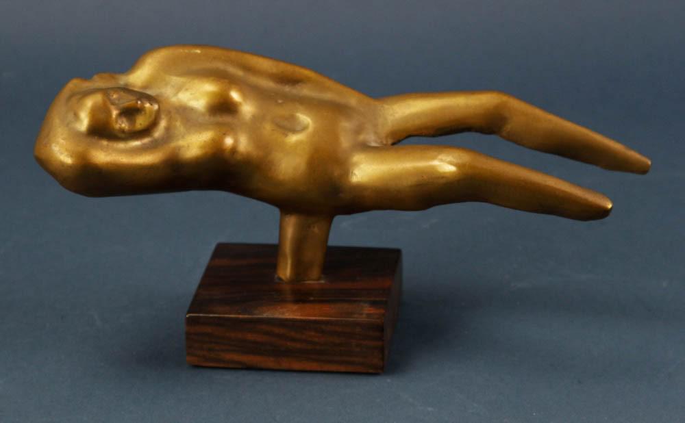 Edgar Britton, Bronze, Reclining Woman: Edgar Britton (American, 1901-1982), "Reclining Woman", bronze, signed, 5" H x 10 1/2" L x 4 1/2" D.