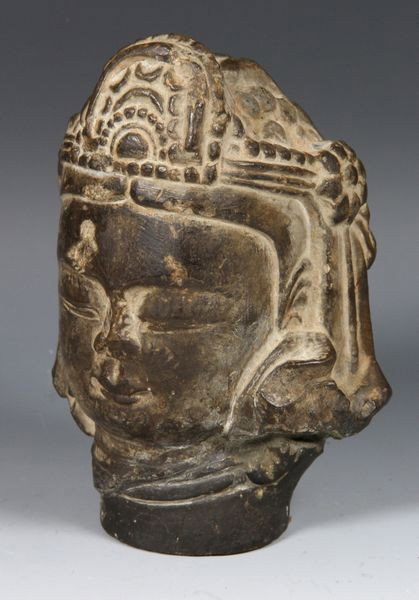 Chinese 14th C. Head of Buddha: Head of Buddha, Northern China, 14th century, carved of stone, 4 1/2" high x 3" wide x 2 1/4" deep. From the collection of Henry Francis Thompson. Henry Thompson, an importer of Asian art and antiques