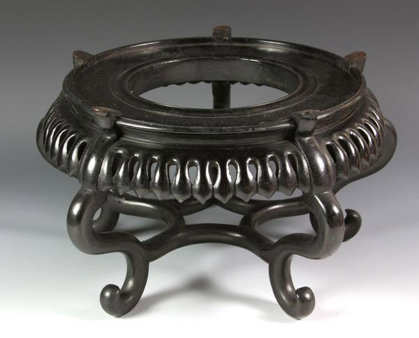 Chinese 19th C. Wood Stand: Wood Stand, China, 19th century, with open center and carved exterior band supported on five S-form legs, 5 3/4" high x 9 1/2" wide. Originally acquired by C.T. Loo & Co. of New York, NY and Paris, Fr