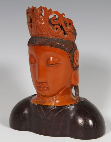 Chinese 19th C. Head of the Buddha: Head of the Buddha, China, 19th century, wearing a crown, mounted on wood shoulders, 6 7/8" high x 5" wide x 2 1/2" deep, some chips.